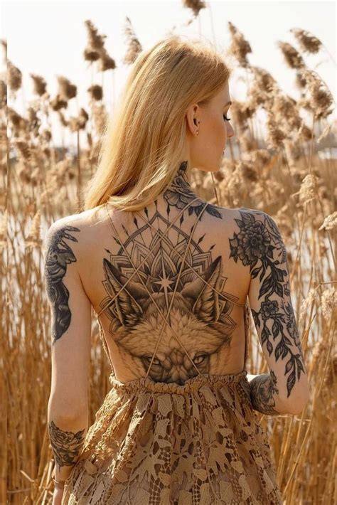 back full tattoo|meaningful back tattoos for females.